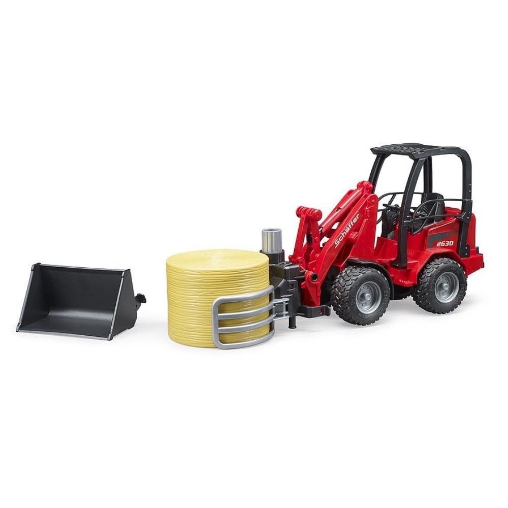 Carregadora Schäffer 2630 com acessórios e fardo de feno