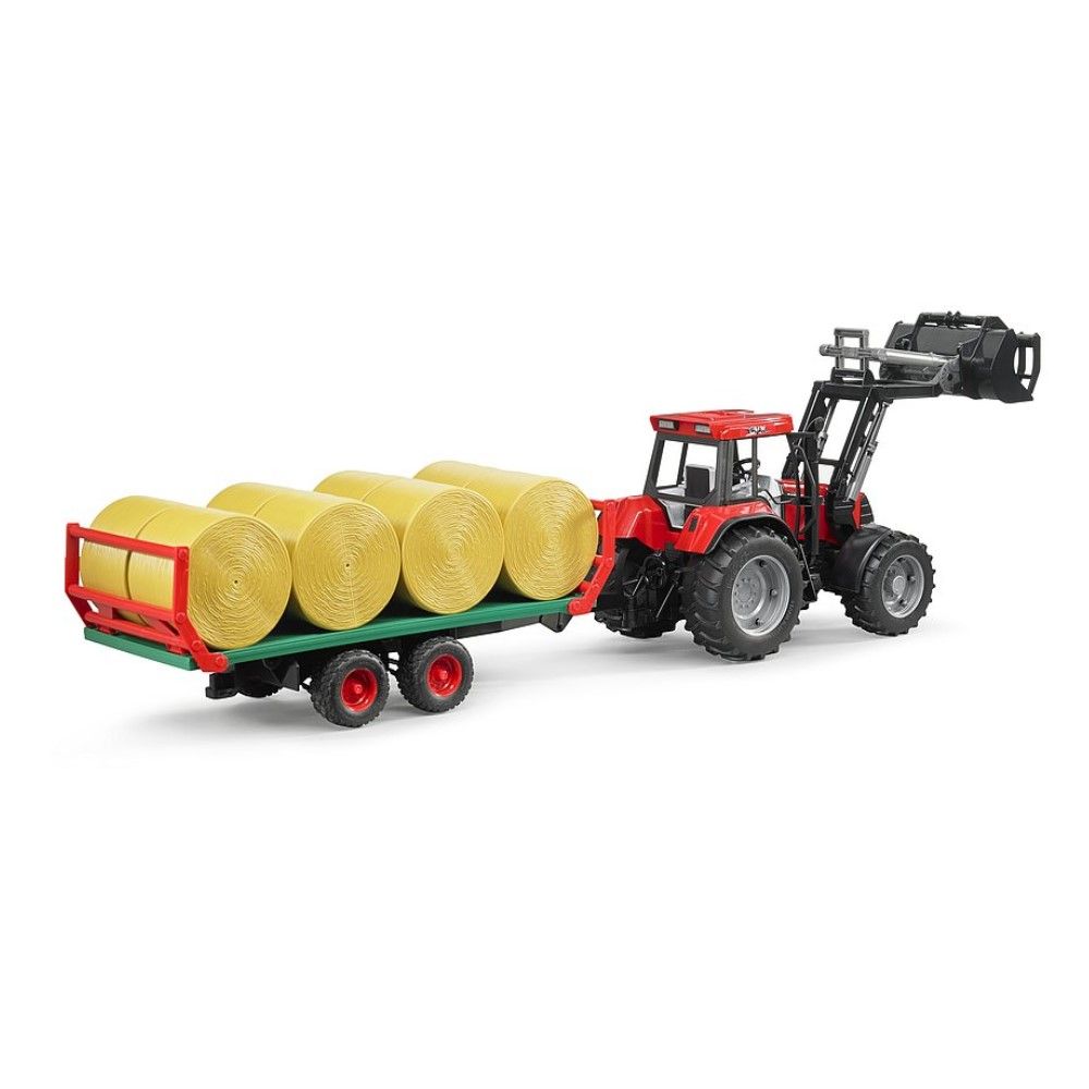 Reboque com 8 fardos de feno redondos