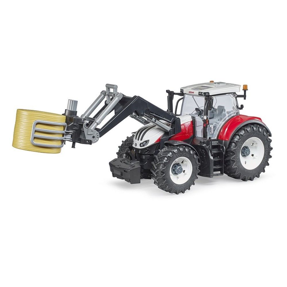 Braçadeira para transporte de fardos de feno com fardos redondos