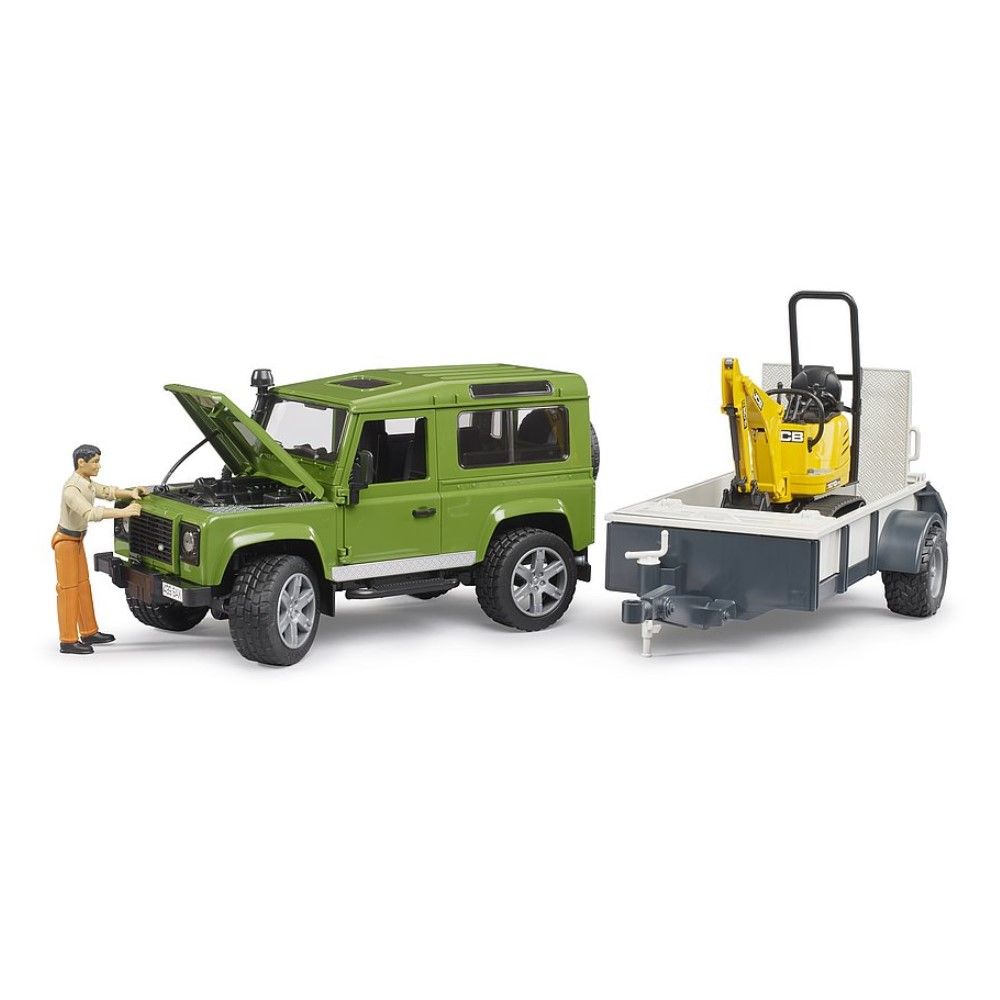 Land Rover Defender com reboque, microescavadora JCB e 1 figura