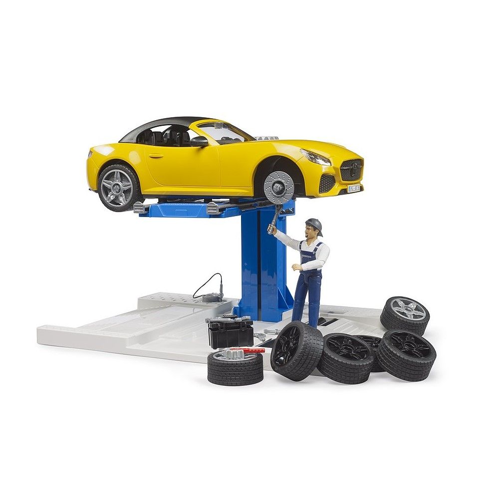 Oficina de automóveis com BRUDER Roadster e acessórios